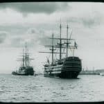 HMS Duke of Wellington and HMS Victory at anchor in Portsmouth Harbour. Image predates 1904 because that was when the Duke of Wellington was broken up