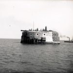 Horse Sand Fort. A steamer can be seen in the water at the side of the fort