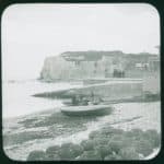 View of Freshwater Gate. Numerous crab pots in the foreground on the beach