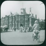 Sandown Library viewed from Culver Parade. A woman is riding a bicycle in the foreground