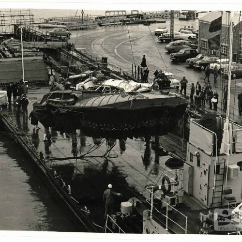 Recovered hovercraft being lifted out of water in Portsmouth Harbour