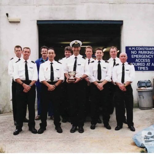 Coastguard team outside the old hut